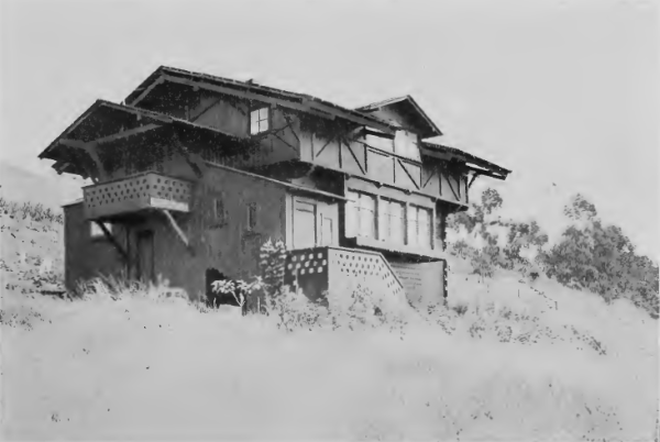 Cottage of Wood with Exterior Open Timber Work